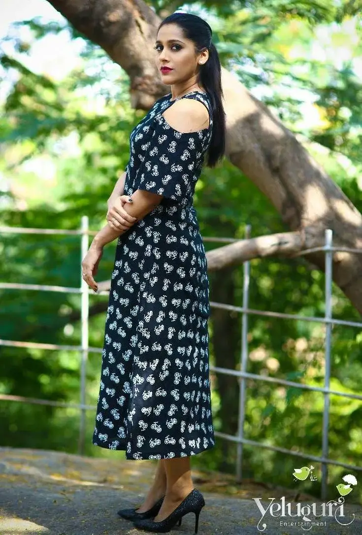 INDIAN TV ANCHOR RASHMI GAUTAM STILLS IN BLACK DRESS 2